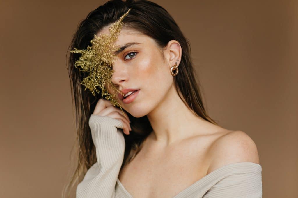 female model dark hair with piercing